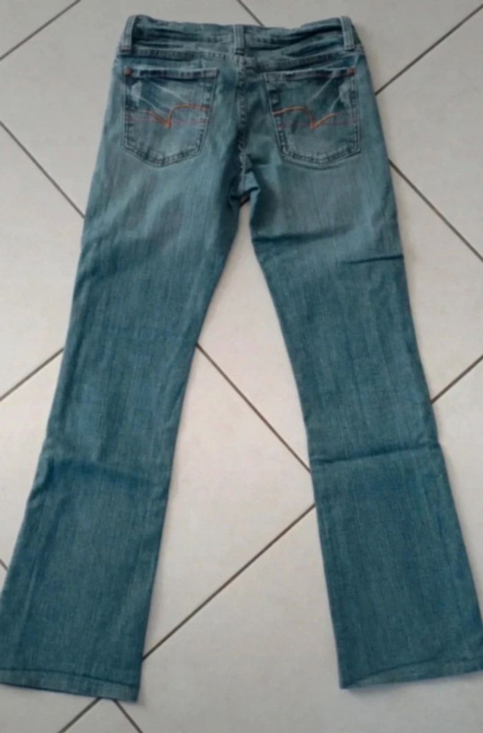 Jean évasé bleu très bon état taille 38 - photo numéro 3