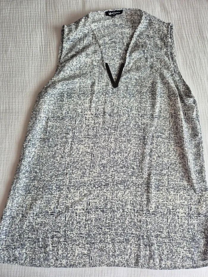 Top sans manche taille 38 blanc et noir
