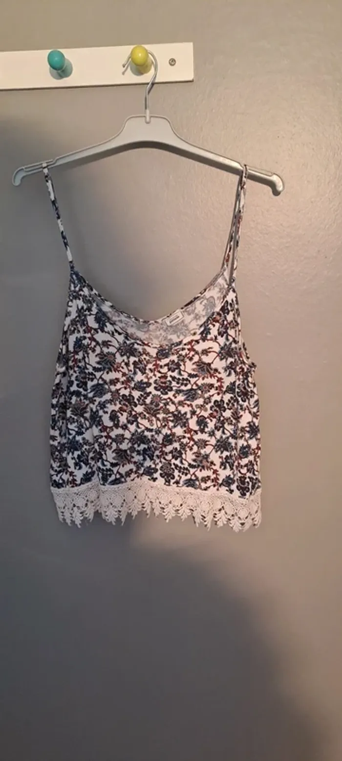 Débardeur femme tons bleu et blanc - Marque Pimkie - Taille 40 - Très bon état.