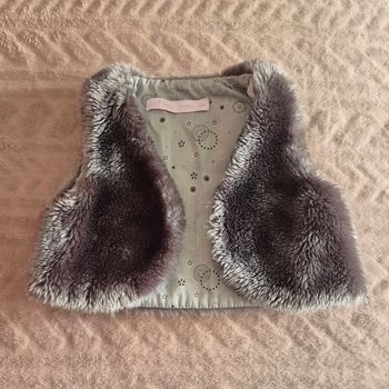 Veste en fourrure grise