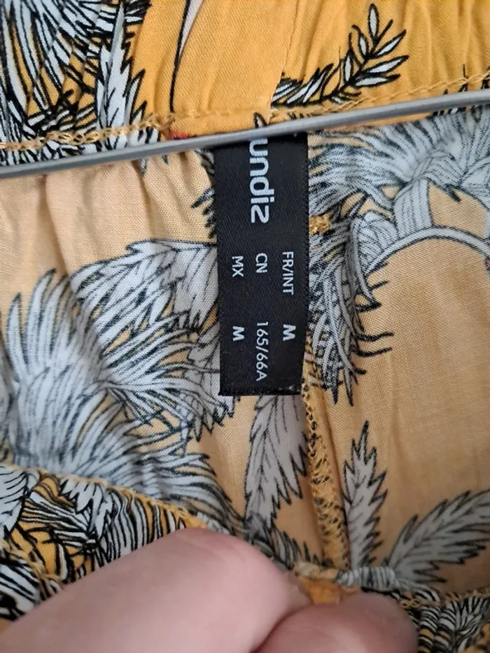 Pantalon fendue - photo numéro 4