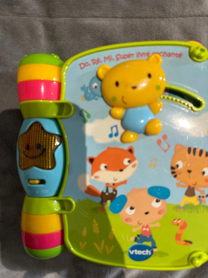 Livre d’éveil sonore do re mi super livre enchanté - photo numéro 2