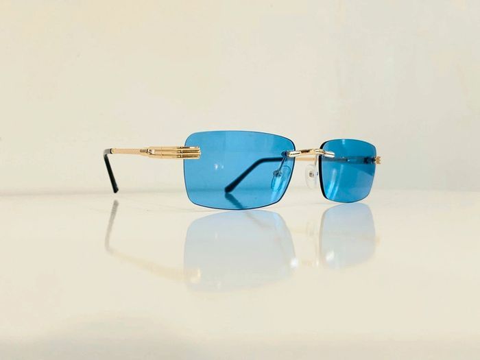 Lunette de soleil mixte percée dorée verres bleus uvprotection taille small - photo numéro 1