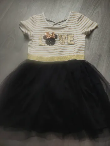 Très belle robe Minnie noire et dorée taille 6 ans en très bon état