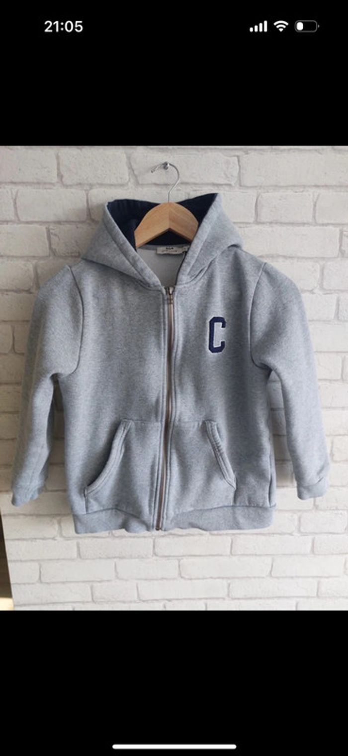 Veste avec capuche Cyrillus taille 12 ans