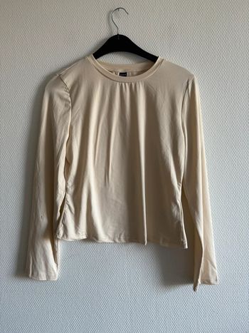 Manche longue beige