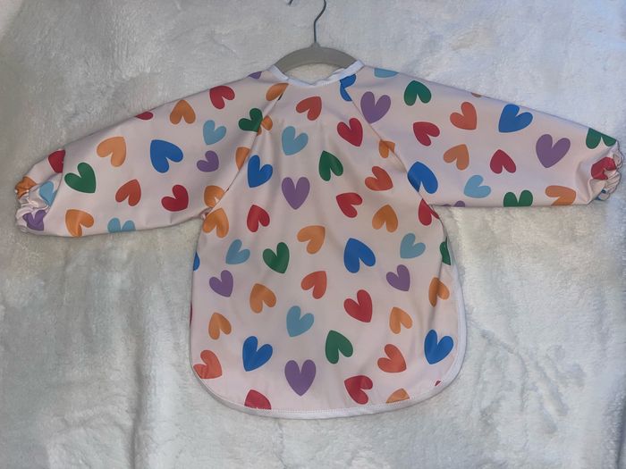 Bavoir plastifié 12/36 mois