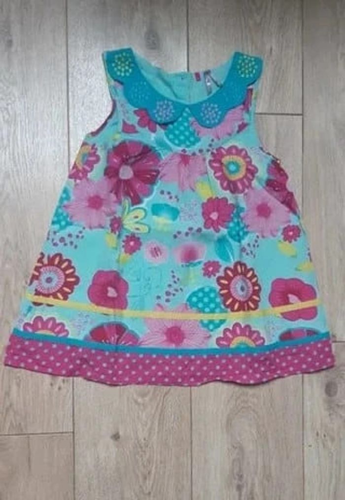 Tunique fleurie rose et turquoise orchestra 8 ans en très bon état