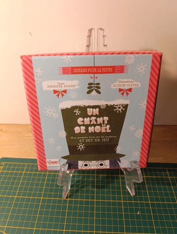 Livre et jeu un chant de Noël Dickens