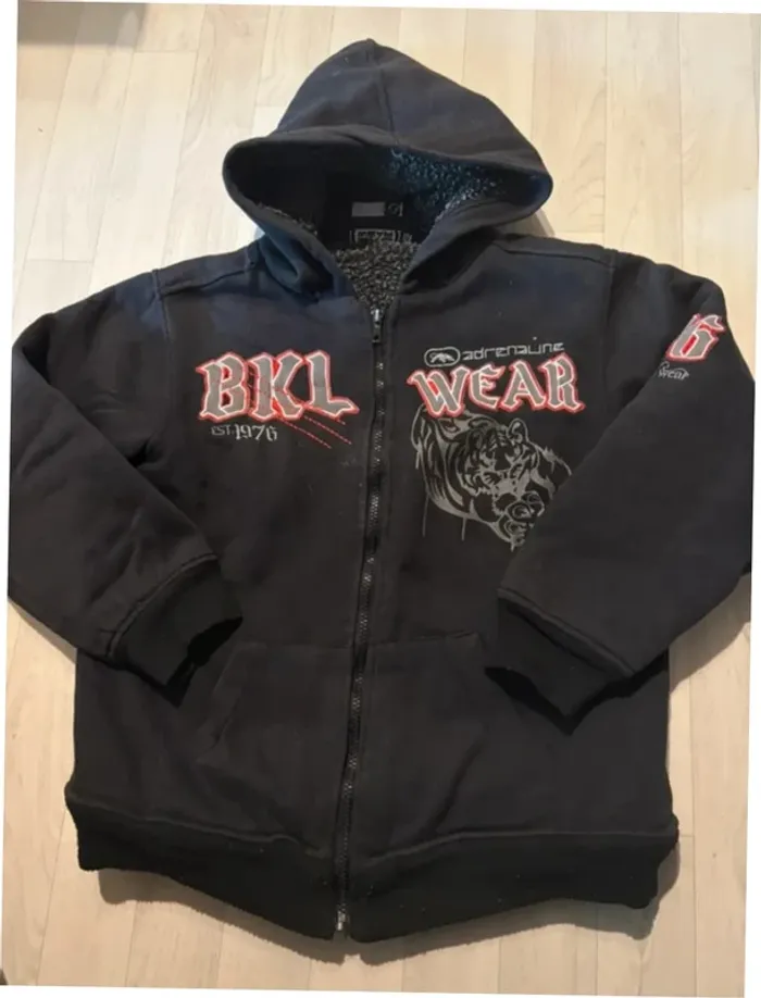 Veste 12 ans épaisse noire bkl wear très bon état