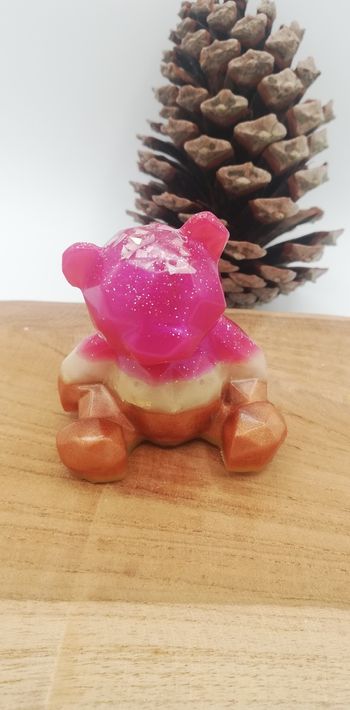 Ourson assis en résine