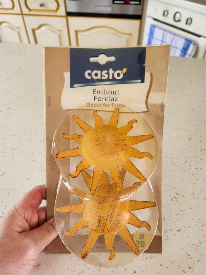 Embout barre rideaux