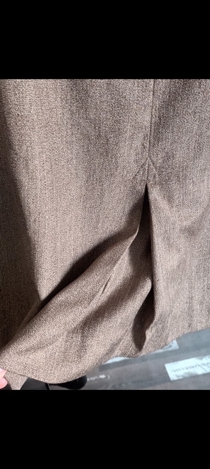 Jolie et élégante jupe chic T40 doublée beige chiné..laine polyester et soie. ..très peu portée 
RODIER - photo numéro 5