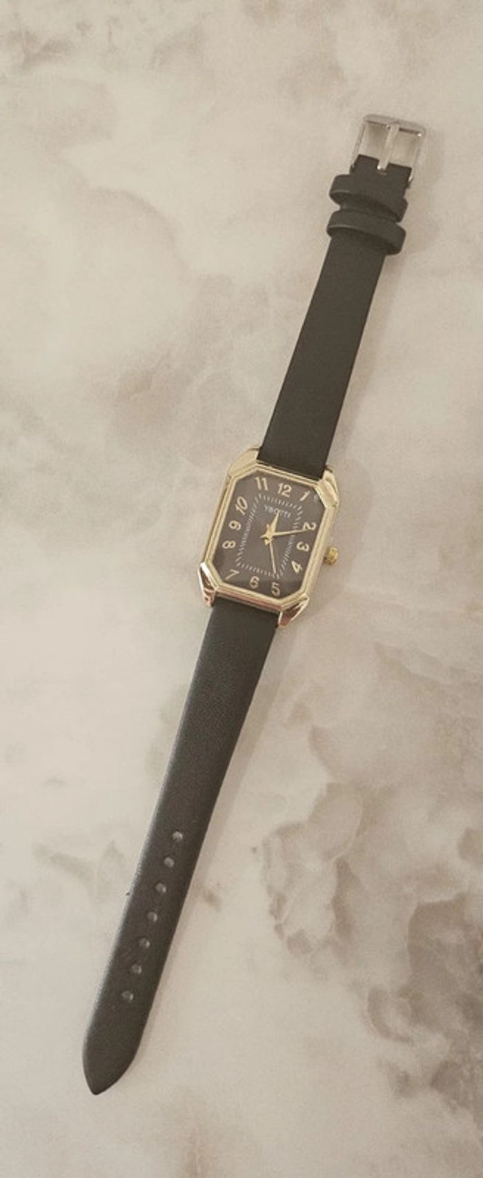 Montre noire - photo numéro 2