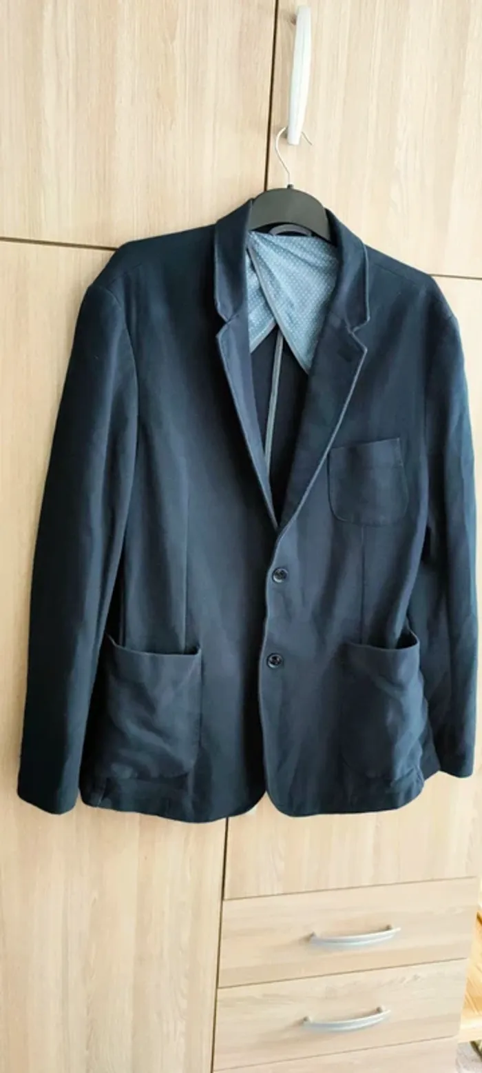 Veste bleu marine Celio club, en très bon état
