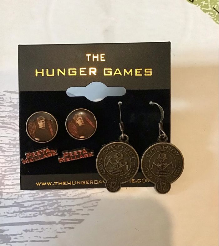 3 paires de boucles d’oreille The Hunger Games