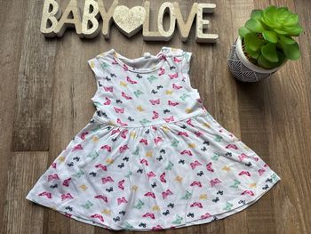 - Robe  - 6 mois - Très bon état 