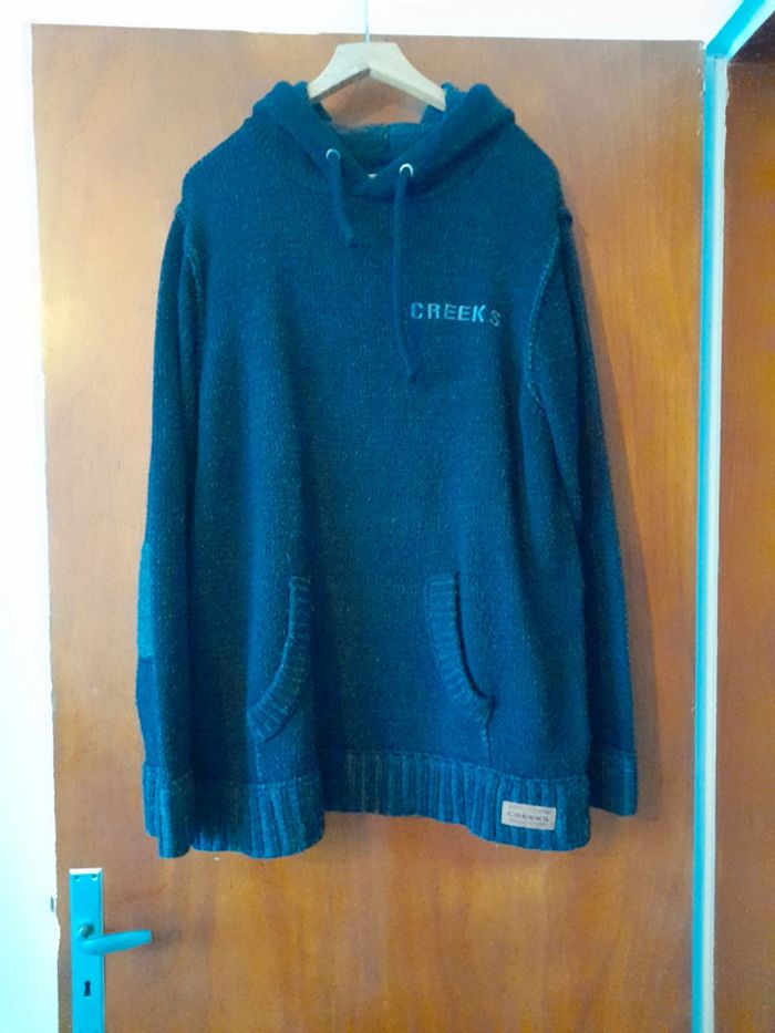 Pull haud à capuche et poche ventrale