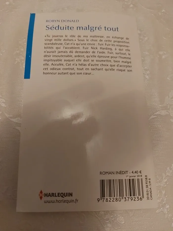 Livre Harlequin Séduite malgré tout - photo numéro 2
