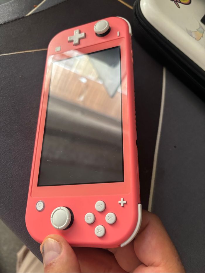 Nintendo switch lite corail - photo numéro 3