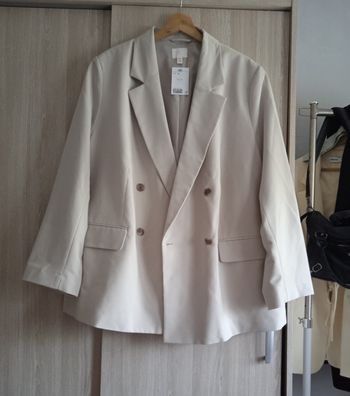 Jolie Veste couleur crème forme overzize