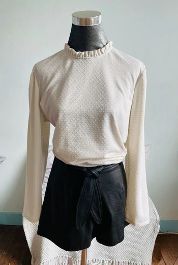 Blouse manches longues Kiabi.