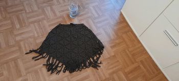 Poncho marron doré.