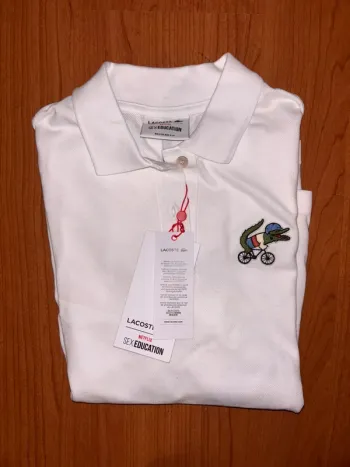 Polo Lacoste T.36 Neuf