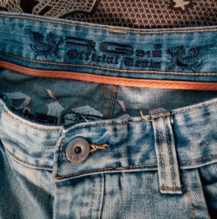 Jeans effet délavé et troués taille 48FR - photo numéro 2