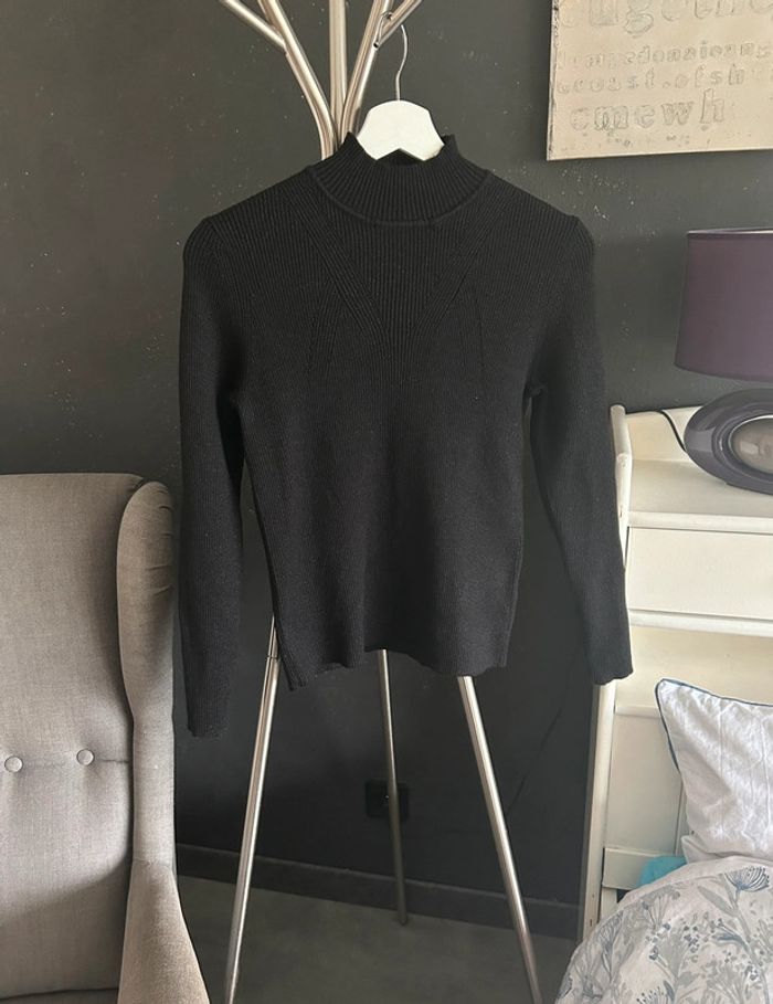 Pull col montant