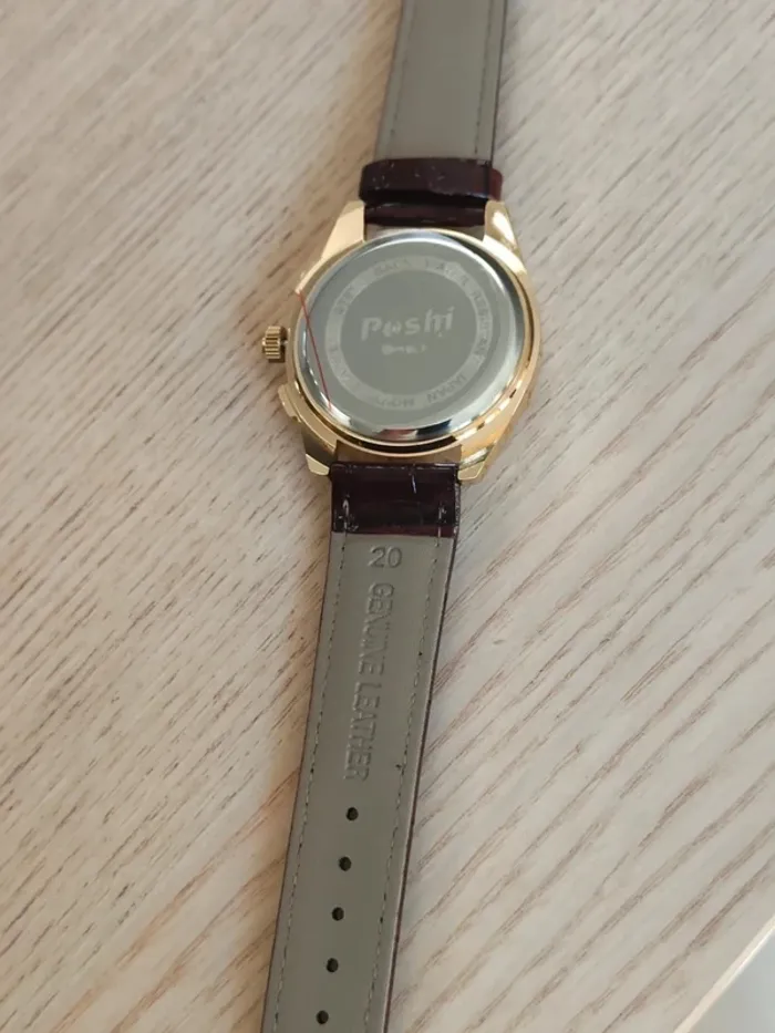 Montre marron, dorée, arrondie à reflets bleus - photo numéro 5