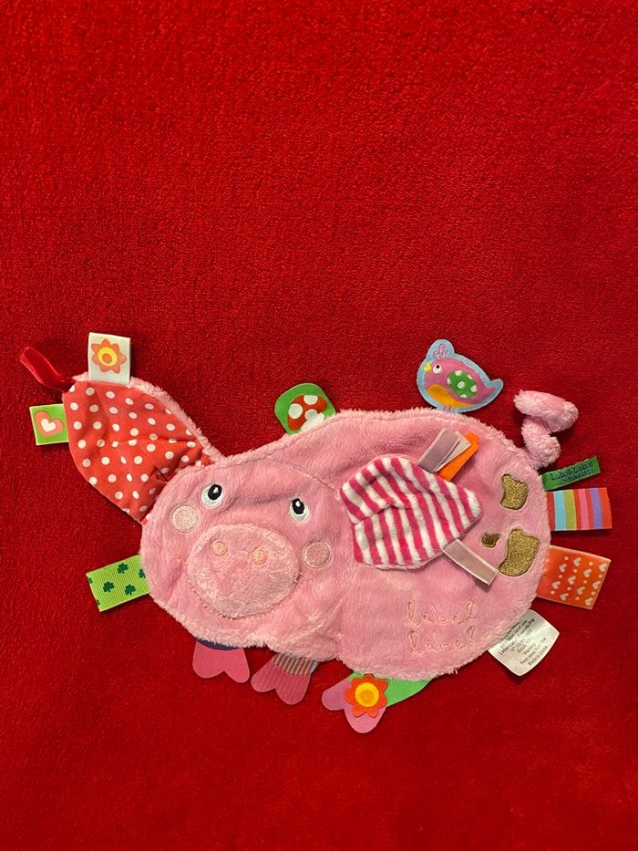 Label label doudou plat cochon activité éveil étiquettes singe queue TTBE - photo numéro 1