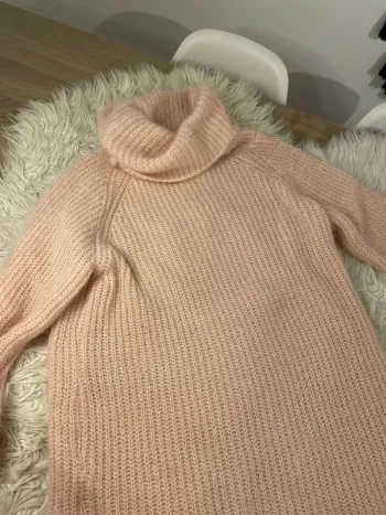 Pull col roulé