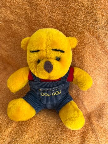 Peluche ours jaune doudou