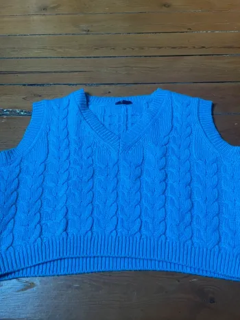 Petit pull sans manche