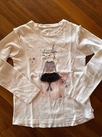 T-shirt manches longues accompagne des petits huit ans fille
