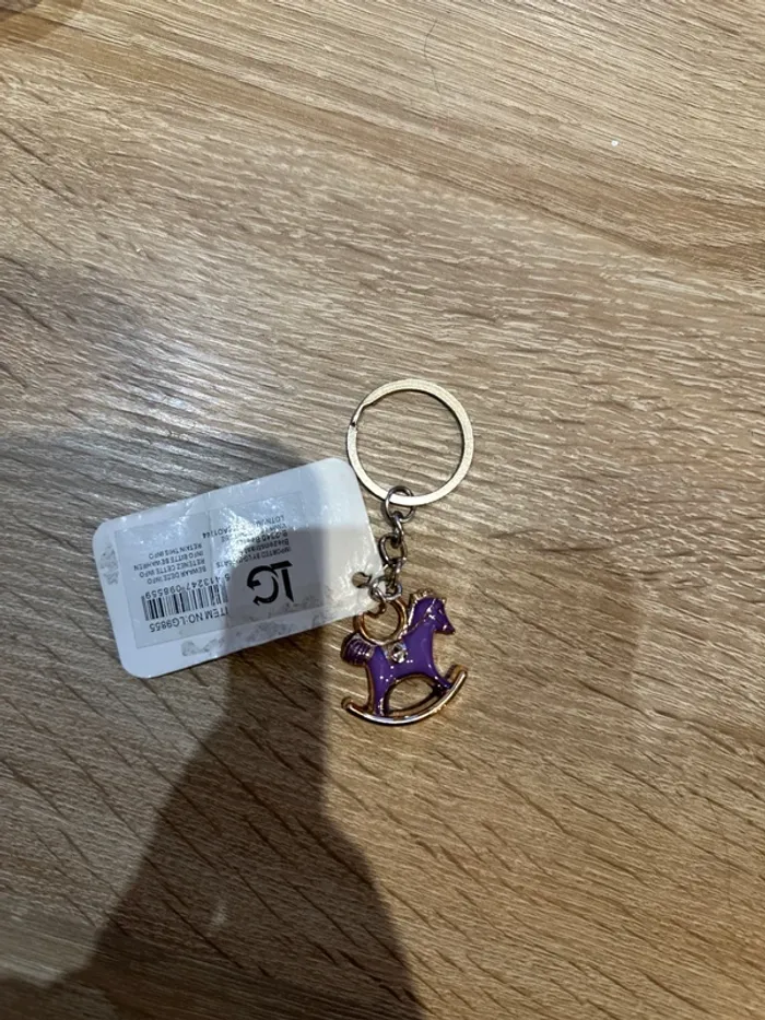 Porte-clés cheval à bascule neuf