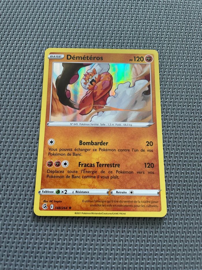 Carte Pokémon Démétéros Holo 148/264 EB08 Poing de Fusion FR