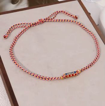 Collier ajustable coloré avec pendentif “Happy”