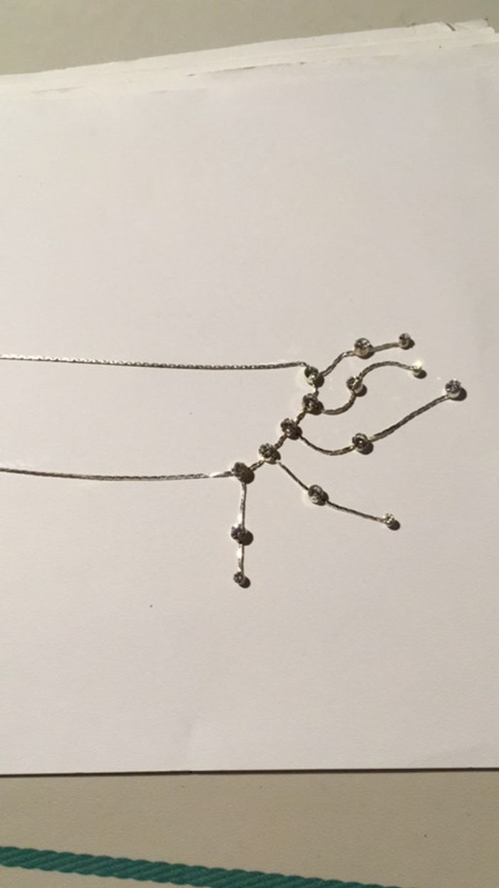 Collier pampilles strass très bon état réglable