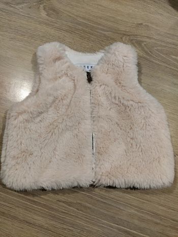 Veste sans manche fourure