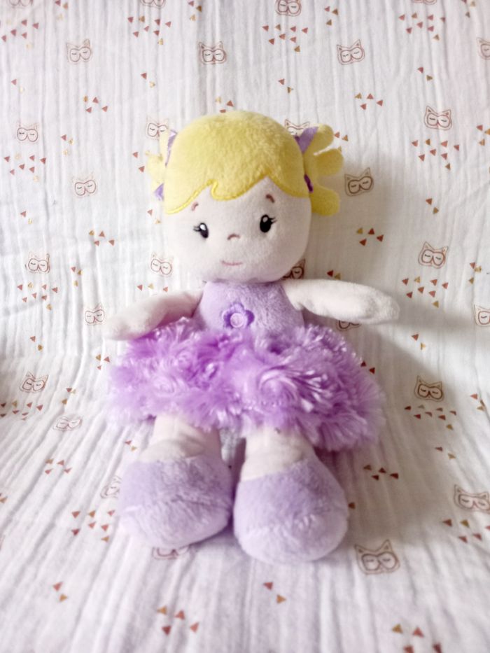 Doudou poupée Toys r us