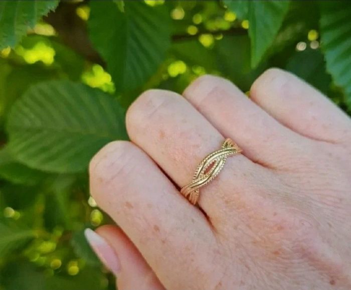 Bague torsadée à l'infini plaqué or taille 58 neuve