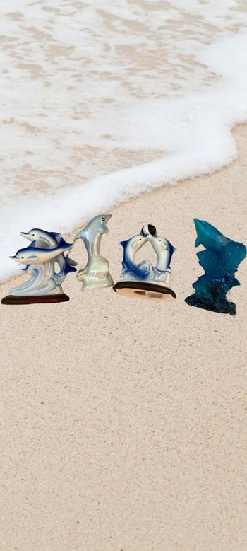 Lot de 4 bibelots dauphins