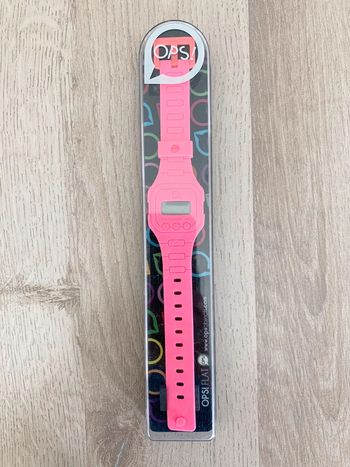 Montre ops rose neuve  pile à remplacer  jamais portée