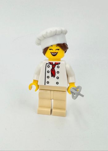 Lego Figurines Ninjago : La Boulangère officielle de la Ville (visage double expression) - NEUF