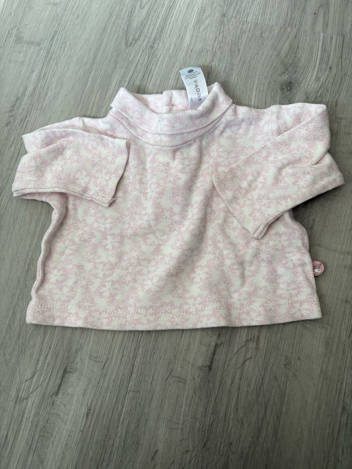 Pull col roulé