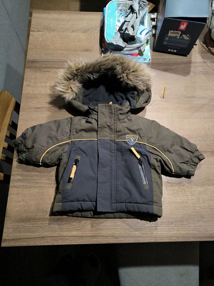 Manteau a capuche Timberland taille 3 mois