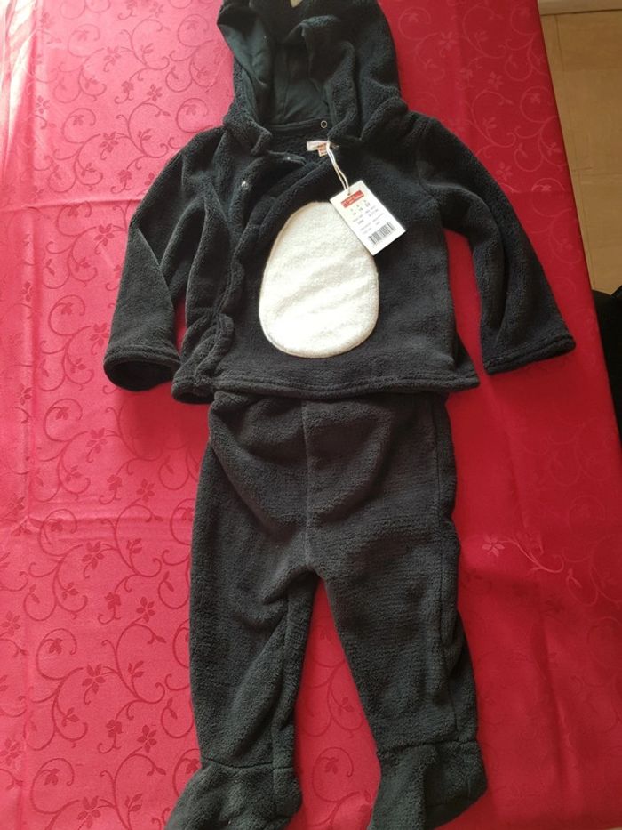 Combinaison 2 ans jamais portée défaut