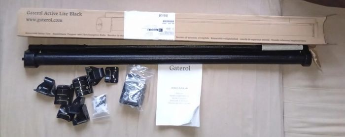 Barrière de sécurité store extensible pour escalier et porte